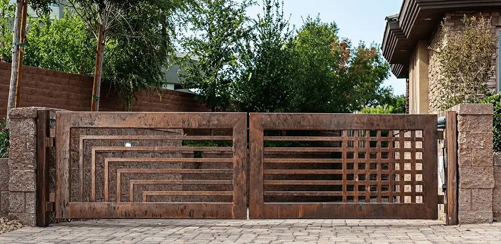 Custom driveway gate installation for a home entrance in Cedar Rapids, IA