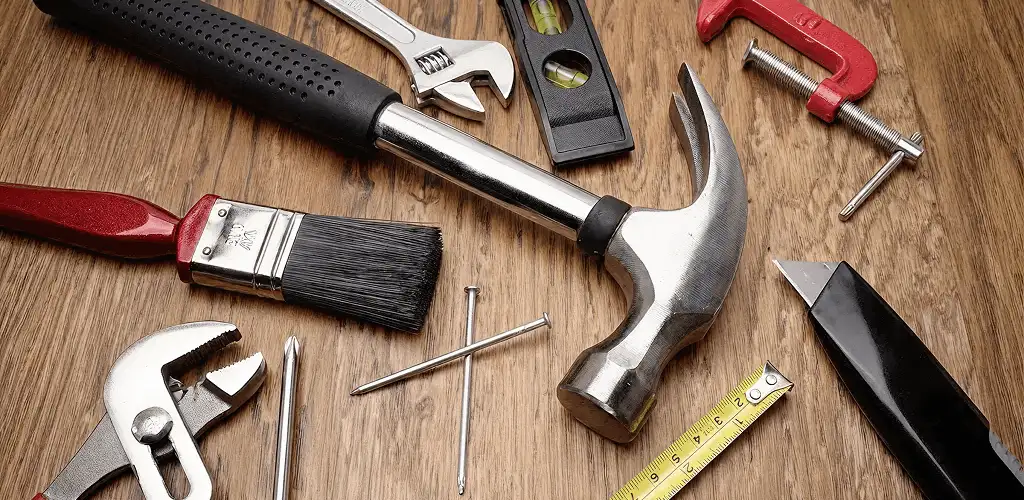 Handyman tools laid out for home repair and maintenance work in Cedar Rapids, IA